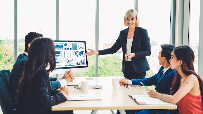 Professional using technology at workstation